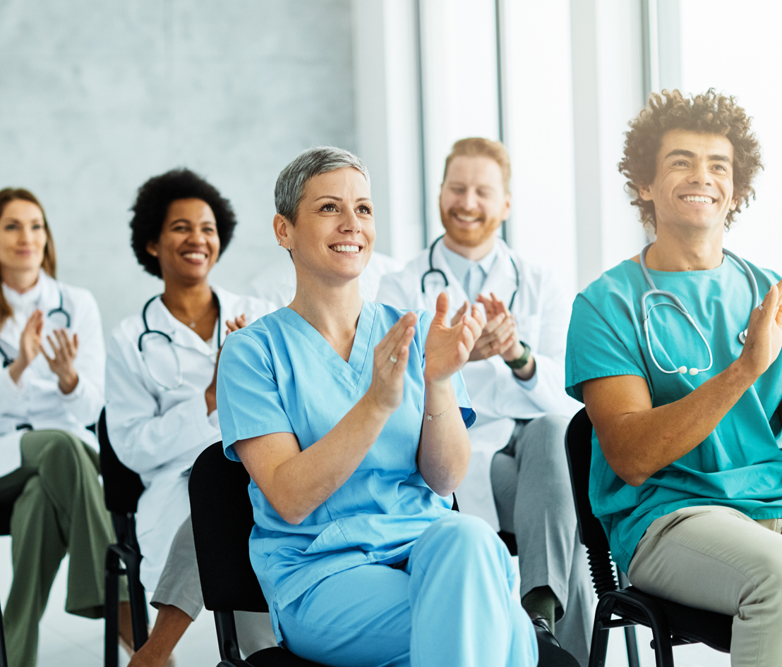 Healthcare professionals at Falcon Institute celebrating educational achievements